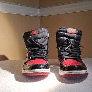 Nike MEN'S Black and Red High-Top AIR JORDAN RETRO HIGH TOP SNEAKERS